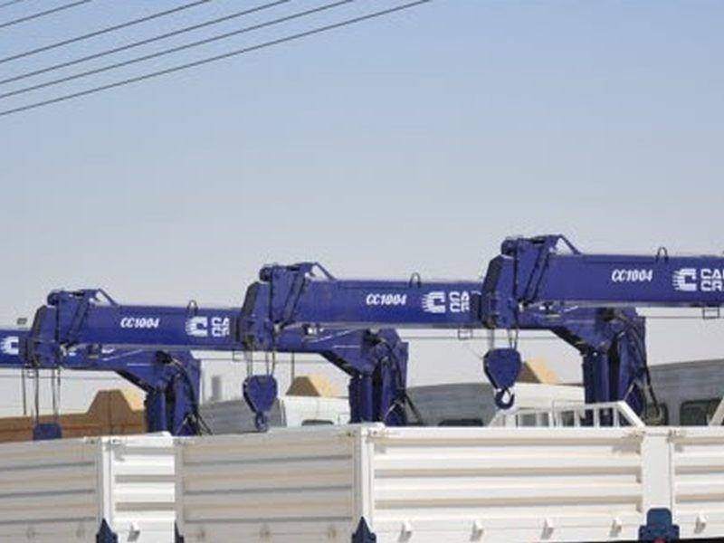 A fleet of Cargo Crane CC1004 units on trucks with fabricated cargo bodies A fleet of Cargo Crane CC1004 units on trucks with fabricated cargo bodies
