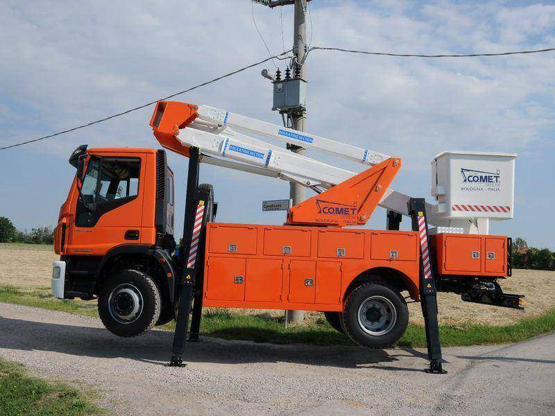 COMET insulated aerial platform on an IVECO chassis with an orange service body COMET insulated aerial platform on an IVECO chassis with an orange service body