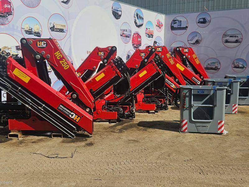 Stock of HC 250 and HC 280 knuckle boom cranes with Ferrari man baskets in Riyadh Stock of HC 250 and HC 280 knuckle boom cranes with Ferrari man baskets in Riyadh