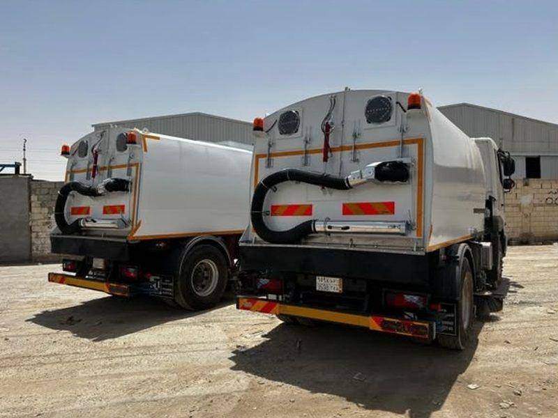 Road sweepers lined up in the workshop yard after completing the build-up Road sweepers lined up in the workshop yard after completing the build-up