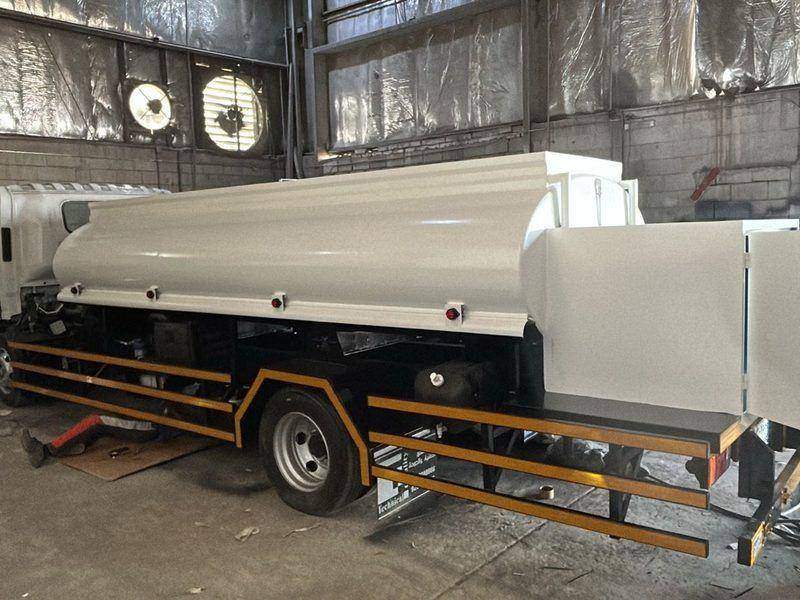 Water tanker fabrication and mounting on a truck chassis in the Riyadh workshop